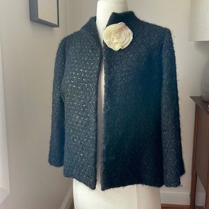 Stylish Mark Hester blazer with swing shape and fabric cream flower pin.